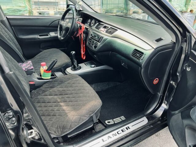 Чорний Міцубісі Lancer, об'ємом двигуна 1.6 л та пробігом 228 тис. км за 3300 $, фото 11 на Automoto.ua