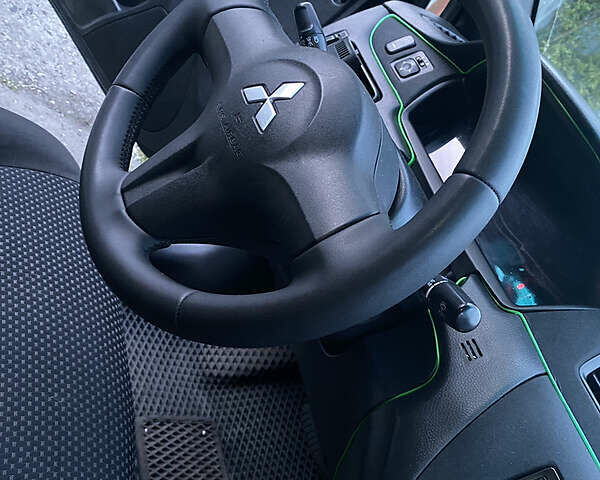 Чорний Міцубісі Lancer, об'ємом двигуна 1.6 л та пробігом 195 тис. км за 5200 $, фото 22 на Automoto.ua