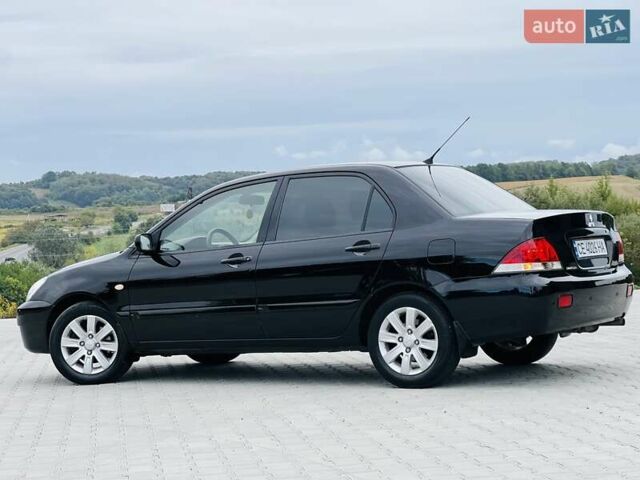 Чорний Міцубісі Lancer, об'ємом двигуна 1.6 л та пробігом 243 тис. км за 4950 $, фото 2 на Automoto.ua
