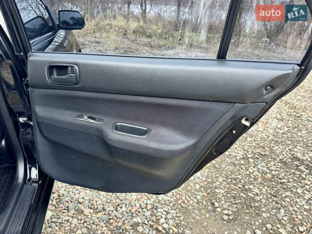 Черный Мицубиси Лансер, объемом двигателя 1.6 л и пробегом 216 тыс. км за 4990 $, фото 16 на Automoto.ua