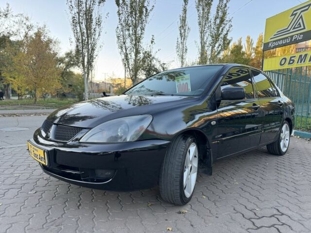 Черный Мицубиси Лансер, объемом двигателя 1.6 л и пробегом 320 тыс. км за 3500 $, фото 2 на Automoto.ua