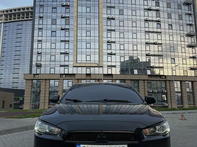 Черный Мицубиси Лансер, объемом двигателя 2 л и пробегом 242 тыс. км за 6200 $, фото 6 на Automoto.ua