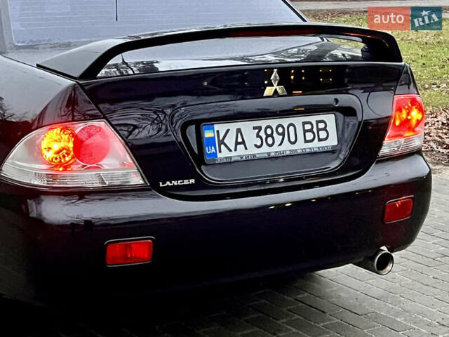 Чорний Міцубісі Lancer, об'ємом двигуна 1.6 л та пробігом 303 тис. км за 4350 $, фото 14 на Automoto.ua
