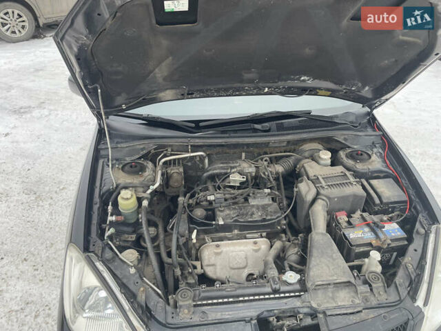 Чорний Міцубісі Lancer, об'ємом двигуна 1.58 л та пробігом 199 тис. км за 4400 $, фото 35 на Automoto.ua