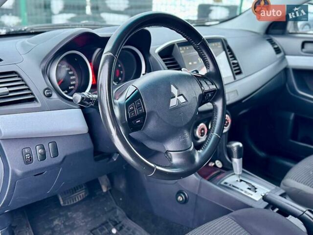Черный Мицубиси Лансер, объемом двигателя 2 л и пробегом 215 тыс. км за 6300 $, фото 17 на Automoto.ua