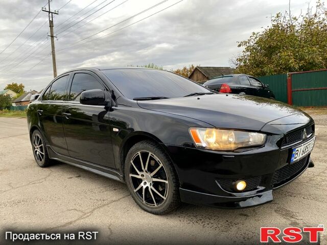 Черный Мицубиси Лансер, объемом двигателя 1.8 л и пробегом 111 тыс. км за 6500 $, фото 12 на Automoto.ua