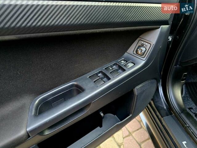 Чорний Міцубісі Lancer, об'ємом двигуна 2 л та пробігом 260 тис. км за 6555 $, фото 20 на Automoto.ua