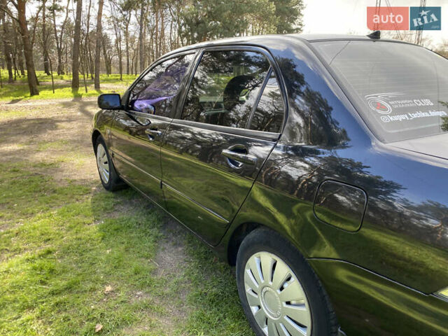 Чорний Міцубісі Lancer, об'ємом двигуна 1.6 л та пробігом 224 тис. км за 4950 $, фото 11 на Automoto.ua