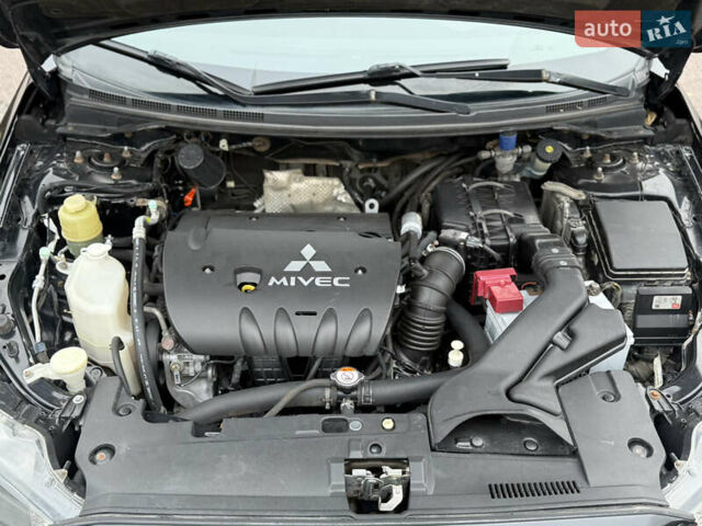 Чорний Міцубісі Lancer, об'ємом двигуна 2 л та пробігом 224 тис. км за 6500 $, фото 12 на Automoto.ua