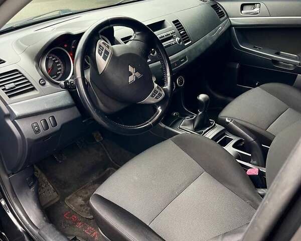 Чорний Міцубісі Lancer, об'ємом двигуна 2 л та пробігом 69 тис. км за 5700 $, фото 8 на Automoto.ua