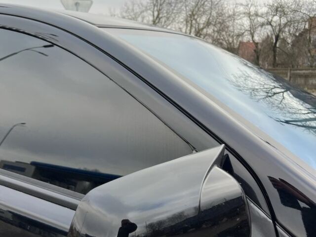 Черный Мицубиси Лансер, объемом двигателя 2 л и пробегом 350 тыс. км за 6700 $, фото 8 на Automoto.ua