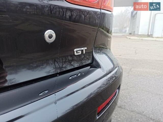 Черный Мицубиси Лансер, объемом двигателя 2 л и пробегом 195 тыс. км за 7899 $, фото 31 на Automoto.ua