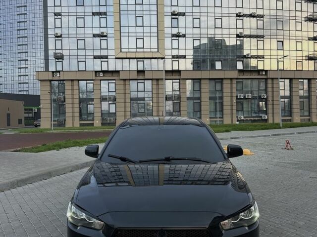 Черный Мицубиси Лансер, объемом двигателя 2 л и пробегом 242 тыс. км за 6200 $, фото 5 на Automoto.ua