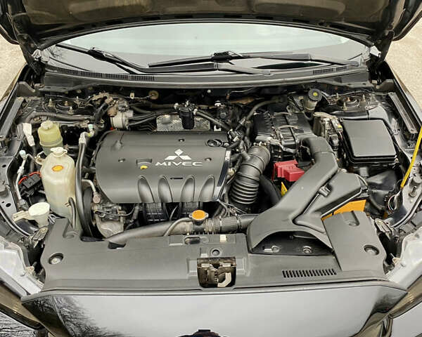 Черный Мицубиси Лансер, объемом двигателя 2 л и пробегом 164 тыс. км за 8300 $, фото 23 на Automoto.ua