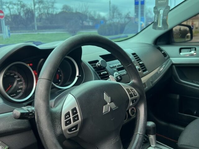 Черный Мицубиси Лансер, объемом двигателя 2 л и пробегом 350 тыс. км за 6700 $, фото 12 на Automoto.ua