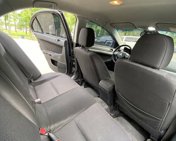 Мицубиси Лансер 2007 в Киеве на Automoto.ua Черный Мицубиси Лансер, объемом двигателя 2 л и пробегом 206 тыс. км за 6900 $, фото 9 на Automoto.ua