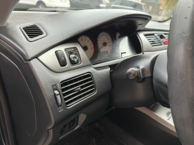 Черный Мицубиси Лансер, объемом двигателя 1.6 л и пробегом 173 тыс. км за 4700 $, фото 12 на Automoto.ua