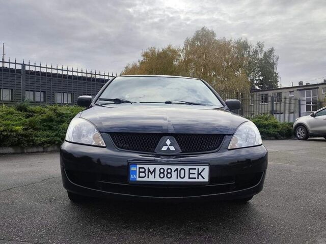 Чорний Міцубісі Lancer, об'ємом двигуна 1.58 л та пробігом 202 тис. км за 4700 $, фото 3 на Automoto.ua