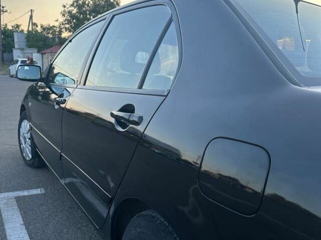 Чорний Міцубісі Lancer, об'ємом двигуна 1.6 л та пробігом 305 тис. км за 4900 $, фото 4 на Automoto.ua