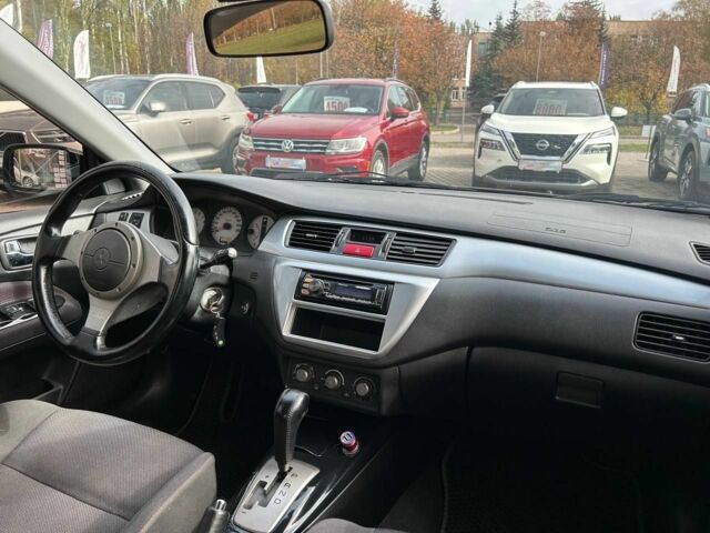 Мицубиси Лансер 2007 в Кривом Роге на Automoto.ua Черный Мицубиси Лансер, объемом двигателя 2 л и пробегом 143 тыс. км за 5400 $, фото 15 на Automoto.ua