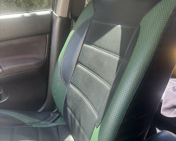 Чорний Міцубісі Lancer, об'ємом двигуна 2 л та пробігом 210 тис. км за 5500 $, фото 43 на Automoto.ua