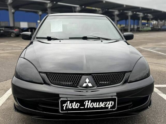 Чорний Міцубісі Lancer, об'ємом двигуна 0 л та пробігом 236 тис. км за 3600 $, фото 2 на Automoto.ua
