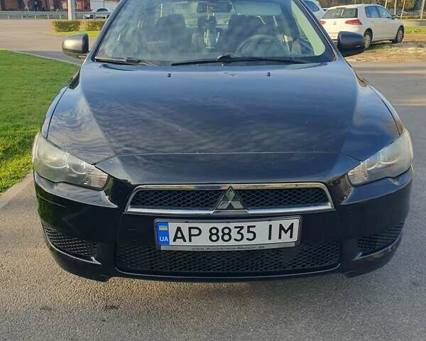 Чорний Міцубісі Lancer, об'ємом двигуна 1.97 л та пробігом 170 тис. км за 6800 $, фото 6 на Automoto.ua