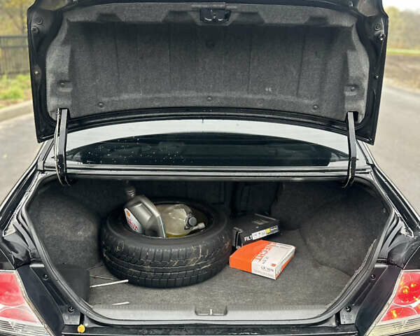 Черный Мицубиси Лансер, объемом двигателя 2 л и пробегом 260 тыс. км за 5300 $, фото 18 на Automoto.ua