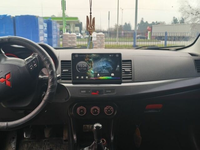 Черный Мицубиси Лансер, объемом двигателя 2 л и пробегом 160 тыс. км за 8000 $, фото 8 на Automoto.ua