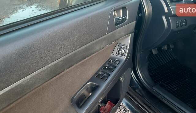 Міцубісі Lancer 2007 у Києві на Automoto.ua Чорний Міцубісі Lancer, об'ємом двигуна 2 л та пробігом 238 тис. км за 5350 $, фото 12 на Automoto.ua