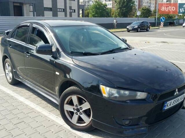 Чорний Міцубісі Lancer, об'ємом двигуна 2 л та пробігом 194 тис. км за 6500 $, фото 1 на Automoto.ua