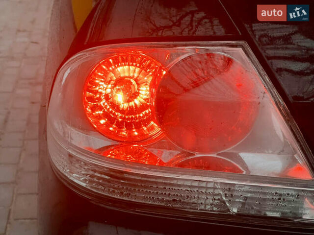 Чорний Міцубісі Lancer, об'ємом двигуна 1.6 л та пробігом 303 тис. км за 4350 $, фото 15 на Automoto.ua