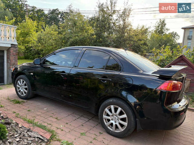 Черный Мицубиси Лансер, объемом двигателя 1.5 л и пробегом 111 тыс. км за 7500 $, фото 19 на Automoto.ua