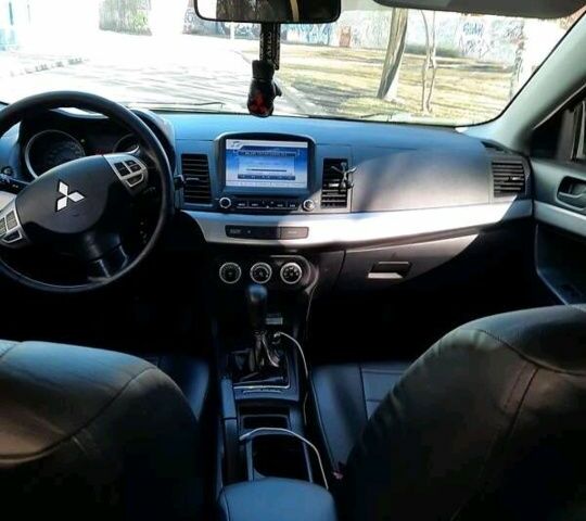 Чорний Міцубісі Lancer, об'ємом двигуна 2 л та пробігом 270 тис. км за 5500 $, фото 5 на Automoto.ua