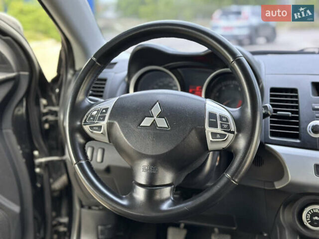 Чорний Міцубісі Lancer, об'ємом двигуна 2 л та пробігом 192 тис. км за 6500 $, фото 28 на Automoto.ua