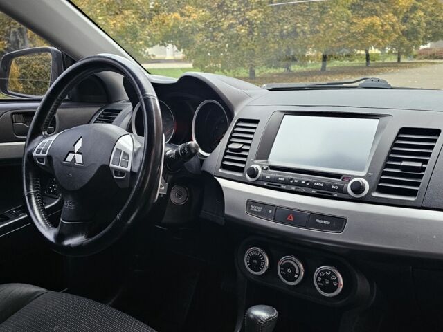 Черный Мицубиси Лансер, объемом двигателя 2 л и пробегом 115 тыс. км за 5000 $, фото 15 на Automoto.ua