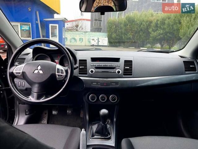 Чорний Міцубісі Lancer, об'ємом двигуна 2 л та пробігом 69 тис. км за 6200 $, фото 12 на Automoto.ua