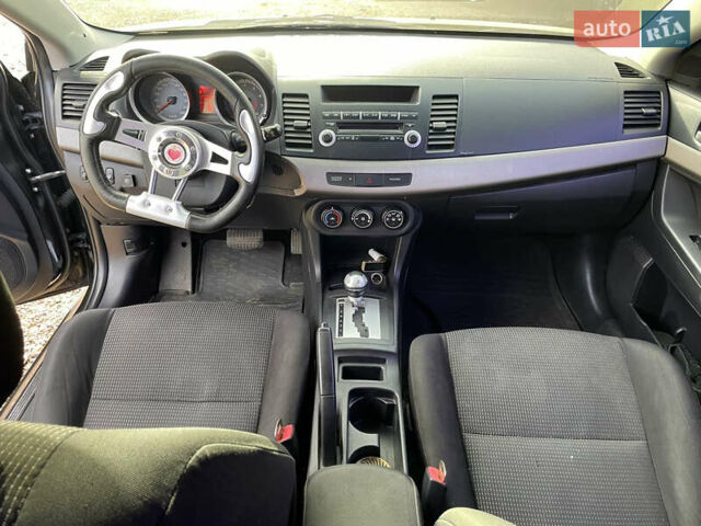 Чорний Міцубісі Lancer, об'ємом двигуна 1.5 л та пробігом 150 тис. км за 6500 $, фото 9 на Automoto.ua