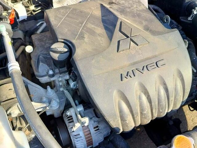 Черный Мицубиси Лансер, объемом двигателя 1.5 л и пробегом 215 тыс. км за 5600 $, фото 11 на Automoto.ua