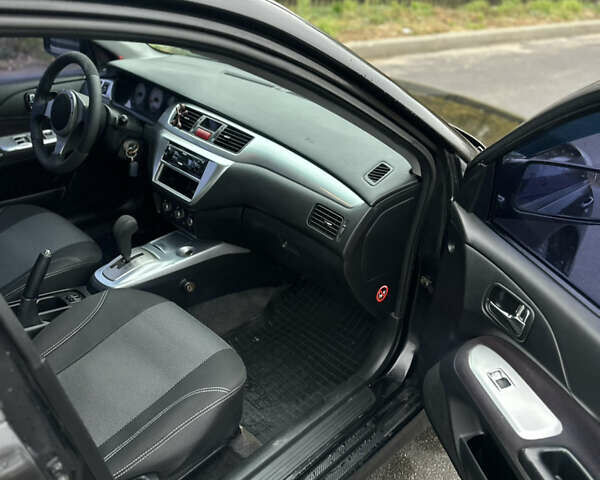 Черный Мицубиси Лансер, объемом двигателя 2 л и пробегом 260 тыс. км за 5300 $, фото 14 на Automoto.ua