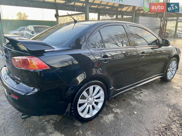 Чорний Міцубісі Lancer, об'ємом двигуна 2 л та пробігом 222 тис. км за 7500 $, фото 4 на Automoto.ua
