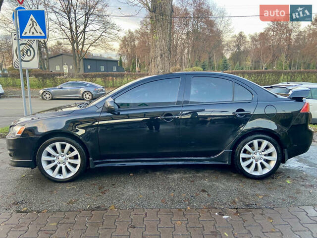 Чорний Міцубісі Lancer, об'ємом двигуна 2 л та пробігом 222 тис. км за 7500 $, фото 1 на Automoto.ua