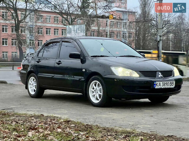 Чорний Міцубісі Lancer, об'ємом двигуна 1.6 л та пробігом 303 тис. км за 4350 $, фото 8 на Automoto.ua
