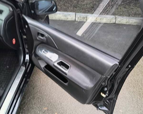 Черный Мицубиси Лансер, объемом двигателя 1.6 л и пробегом 309 тыс. км за 4000 $, фото 22 на Automoto.ua