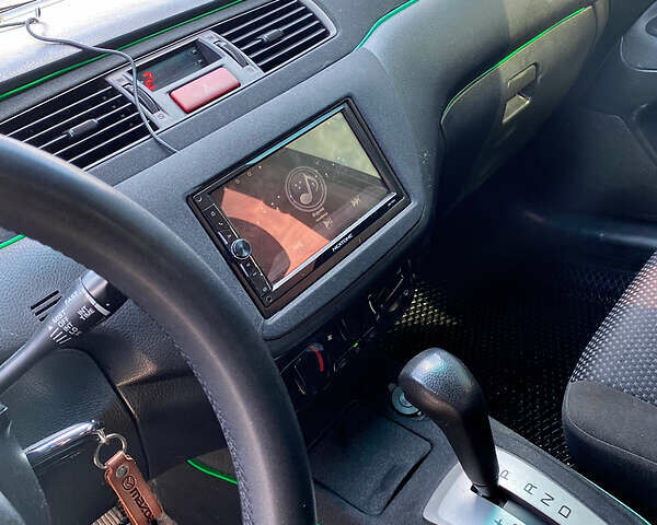 Чорний Міцубісі Lancer, об'ємом двигуна 1.6 л та пробігом 195 тис. км за 5200 $, фото 12 на Automoto.ua