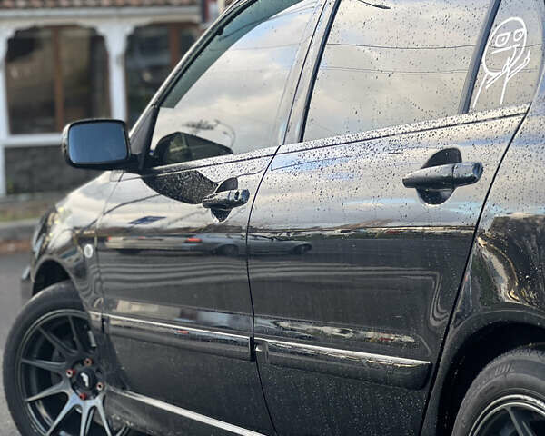 Черный Мицубиси Лансер, объемом двигателя 1.6 л и пробегом 211 тыс. км за 5700 $, фото 14 на Automoto.ua