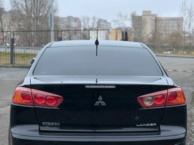 Чорний Міцубісі Lancer, об'ємом двигуна 0 л та пробігом 245 тис. км за 4499 $, фото 5 на Automoto.ua