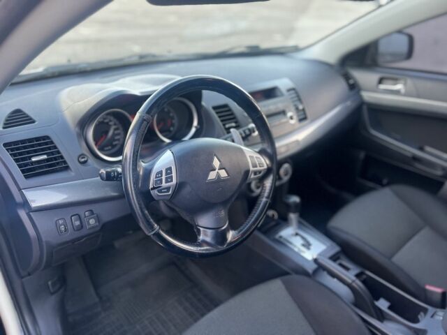 Черный Мицубиси Лансер, объемом двигателя 2 л и пробегом 170 тыс. км за 7900 $, фото 11 на Automoto.ua