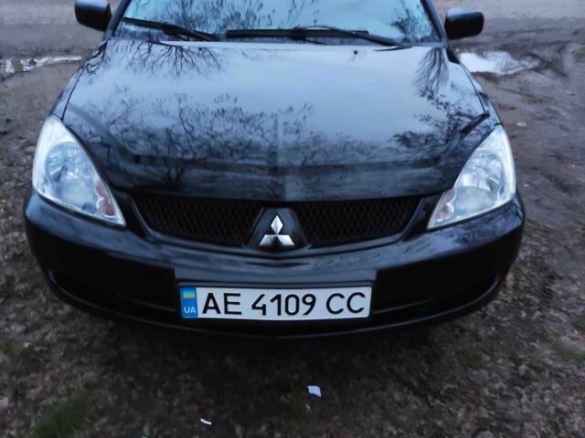 Чорний Міцубісі Lancer, об'ємом двигуна 1.6 л та пробігом 259 тис. км за 4500 $, фото 7 на Automoto.ua