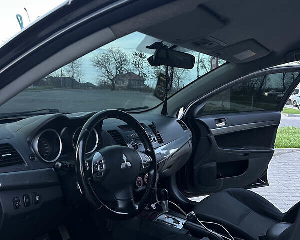 Черный Мицубиси Лансер, объемом двигателя 2 л и пробегом 245 тыс. км за 6200 $, фото 13 на Automoto.ua